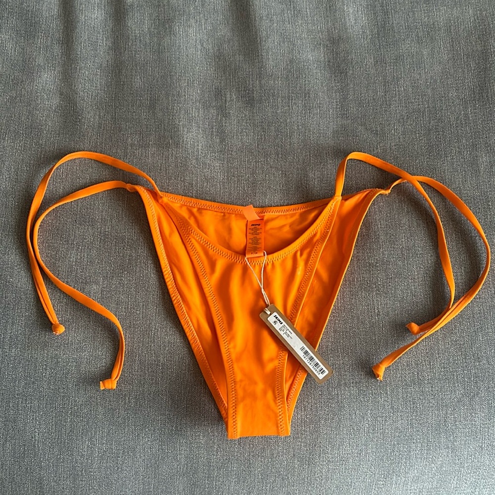 Skims orange bikini bottom. Size small